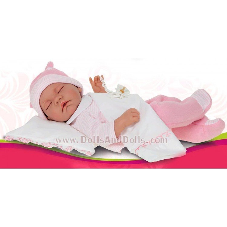 Nacido dormido rosa con cojín