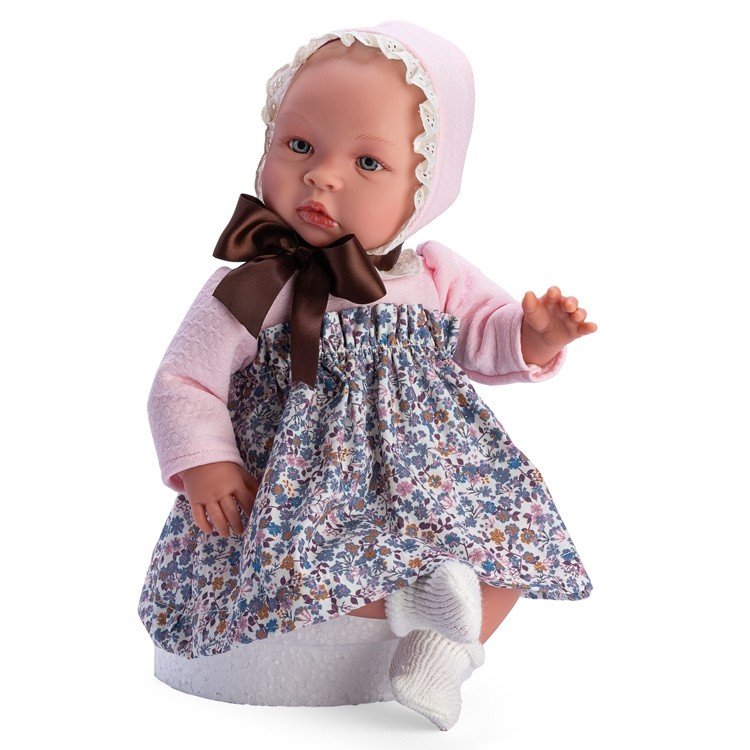 Poupée Así 46 cm - Leo avec une robe bleue à fleurs et un bavoir rose