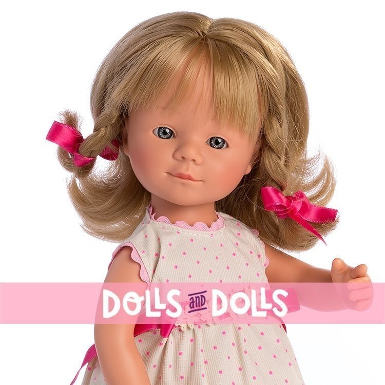 D'Nenes Puppe 34 cm - Marieta mit Zöpfen und Punkten bedrucktes Kleid