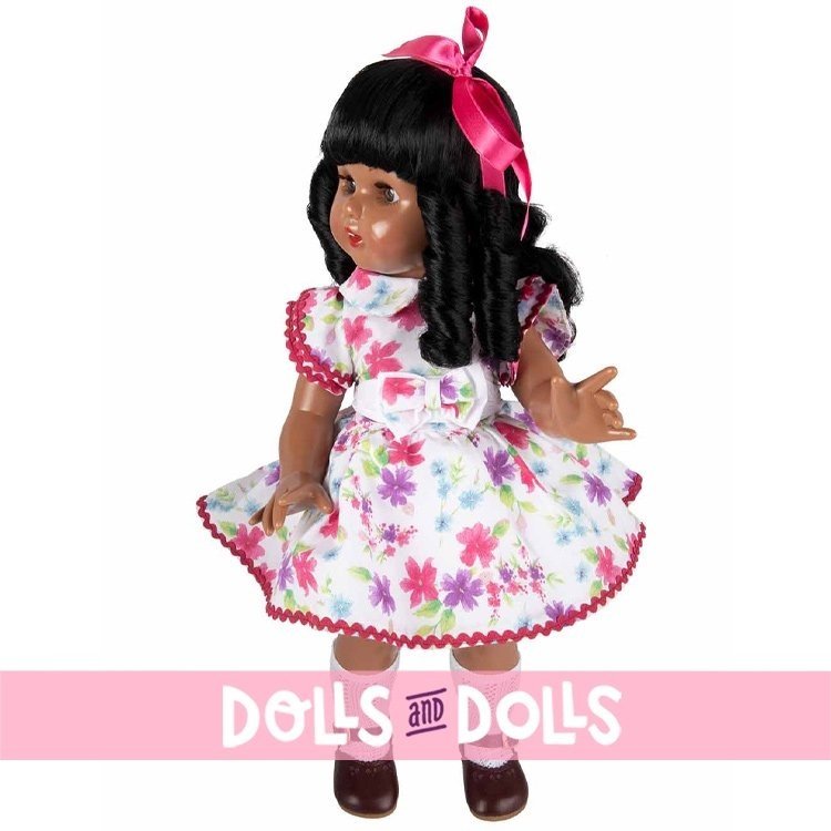 Mariquita Pérez Puppe 50 cm - Afroamerikanerin in einem fuchsiafarbenen Blumenkleid