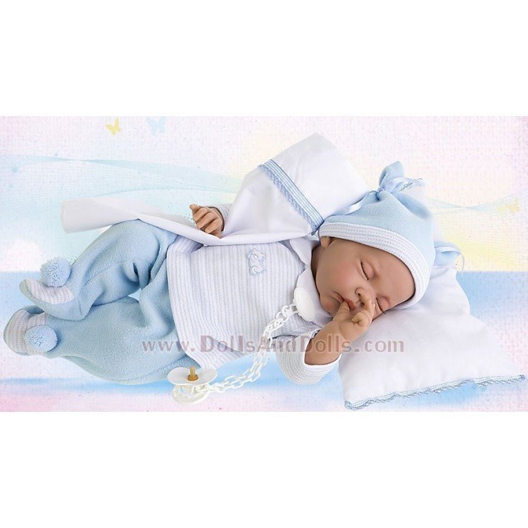 Nacido dormido azul con cojín