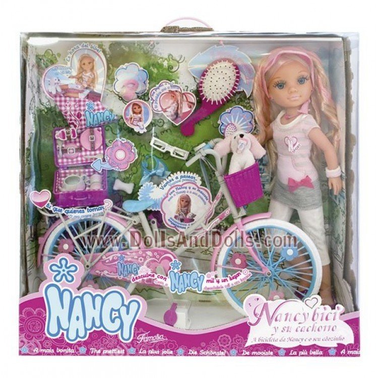 Nancy con una bici e il suo cucciolo